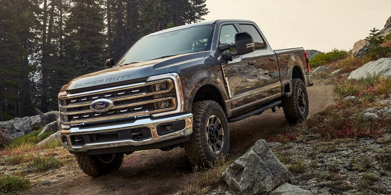 Ford Super Duty truck driving on an off-road trail